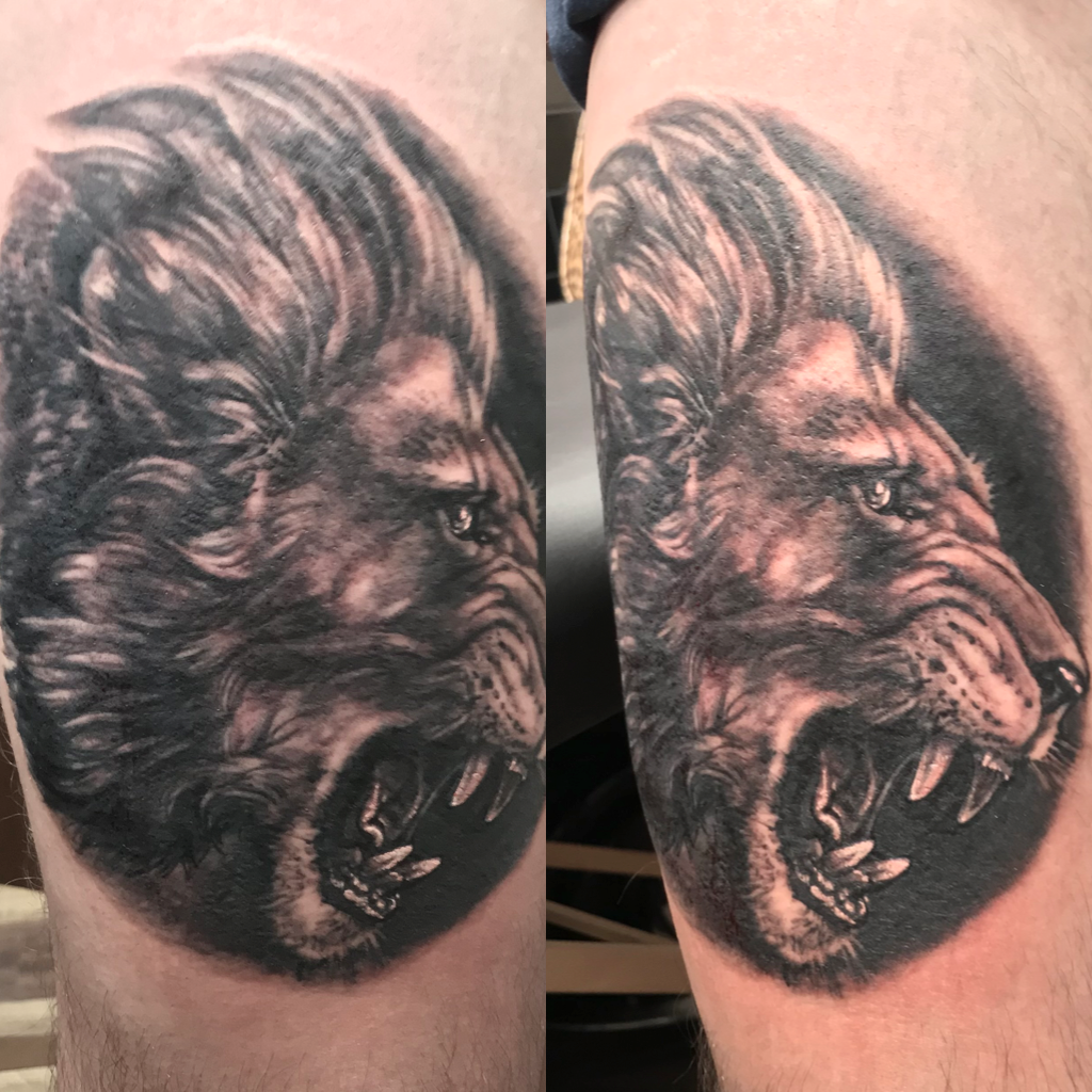 Lion head tattoo