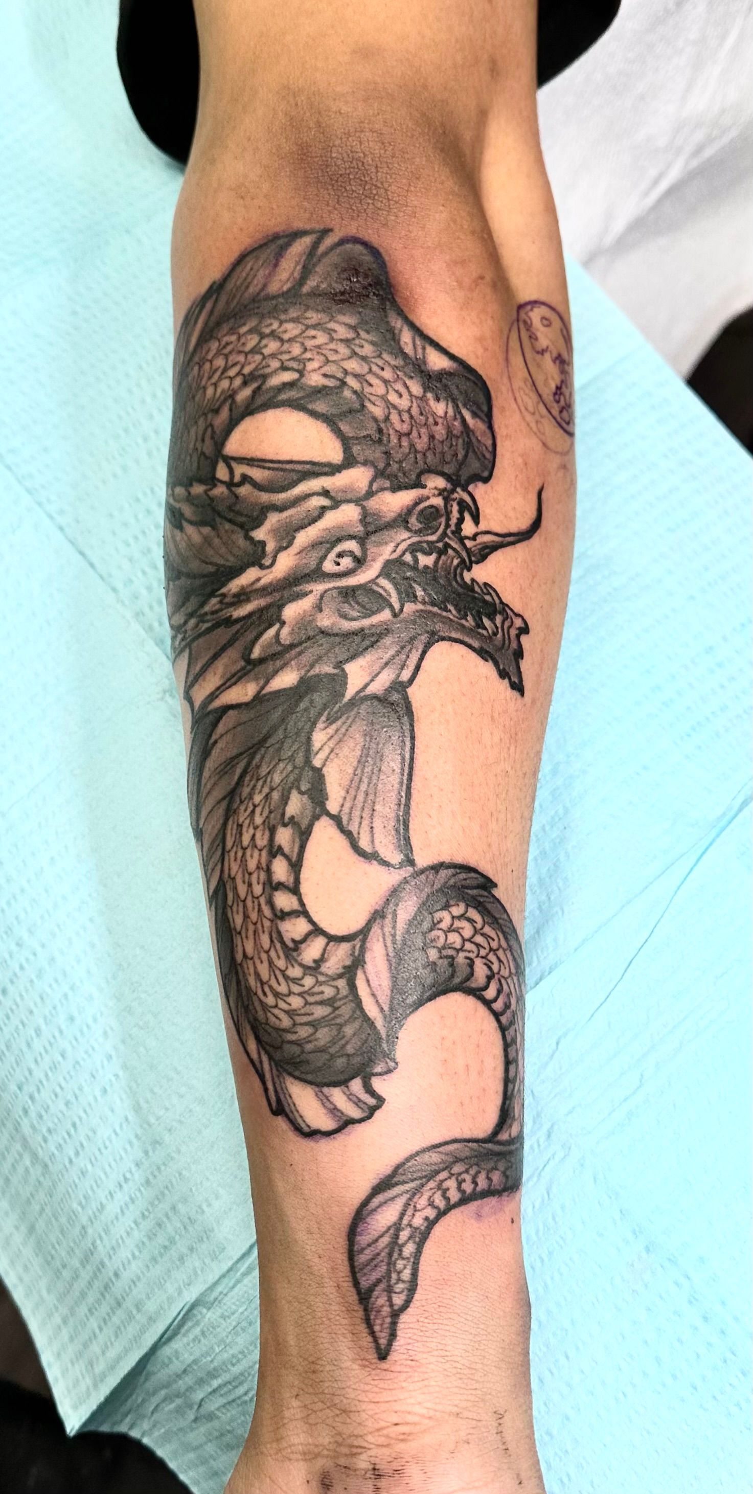 Sea serpent tattoo