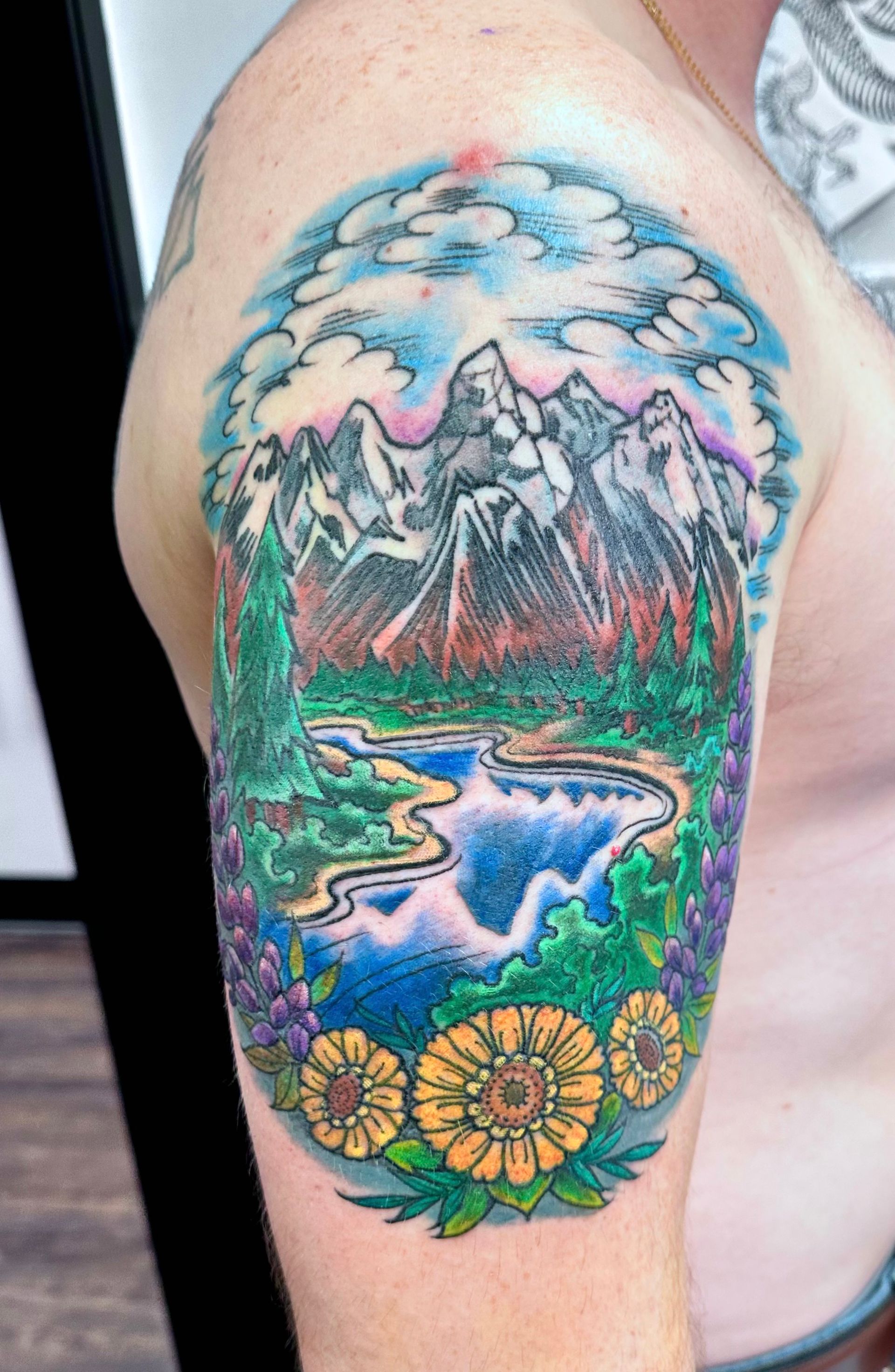 Mountain scene tattoo