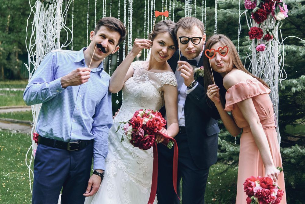 Bride and Groom Pose With Friends Outdoors — Amanda Jade Photography In Gordonvale, QLD
