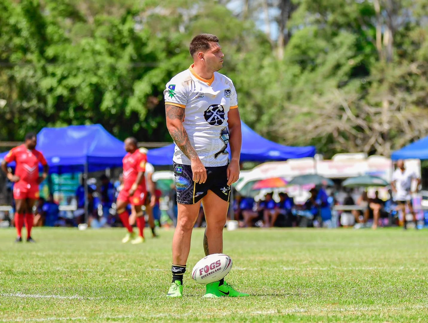 Rugby Player in White Jersey — Amanda Jade Photography In Gordonvale, QLD