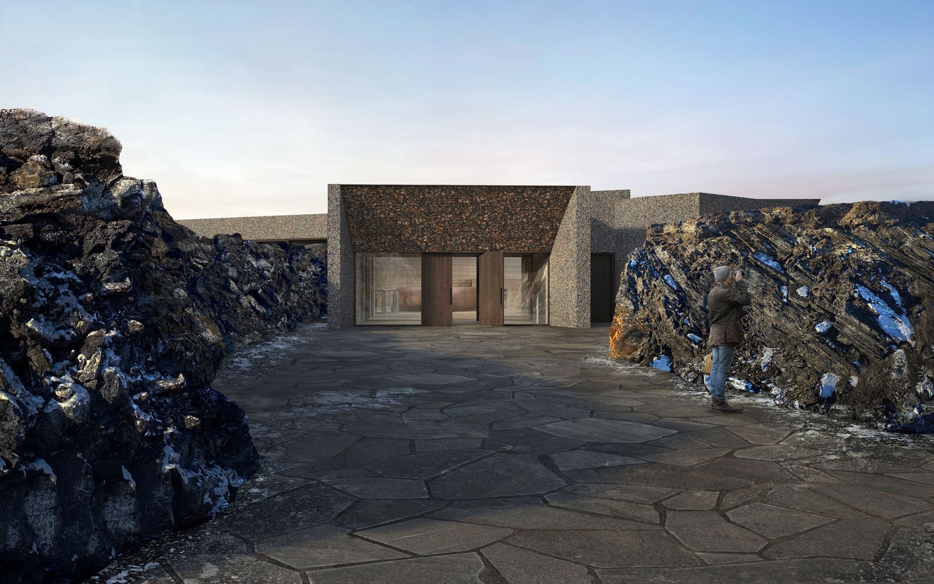 People relaxing in a blue geothermal spa with rock walls, viewed from a window.