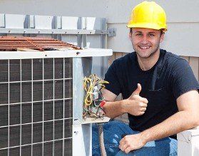 Technician and AC Unit - Commercial Air Conditioning