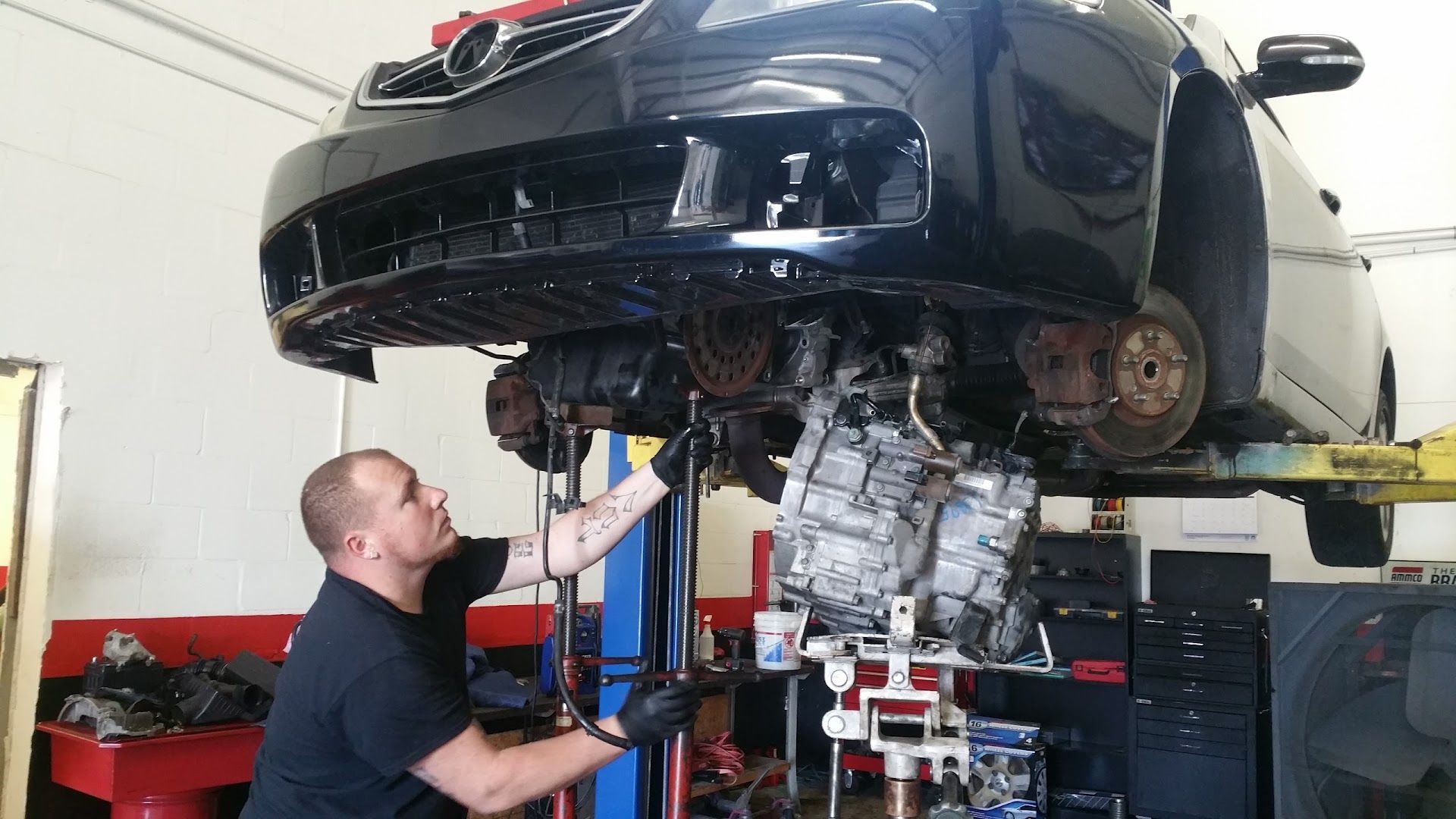 Mechanic working on auto repair service | Cars Unlimited Auto Repair