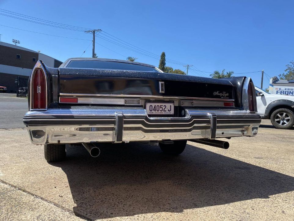 A Black Car That is Parked on the Side of the Road — Savins Radiator Service In Lismore, NSW