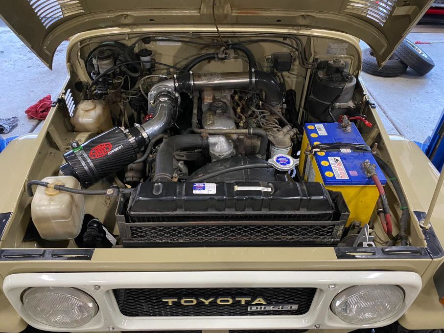 The Engine of a Toyota Land Cruiser is Shown With the Hood Open — Savins Radiator Service In Murwillumbah, NSW