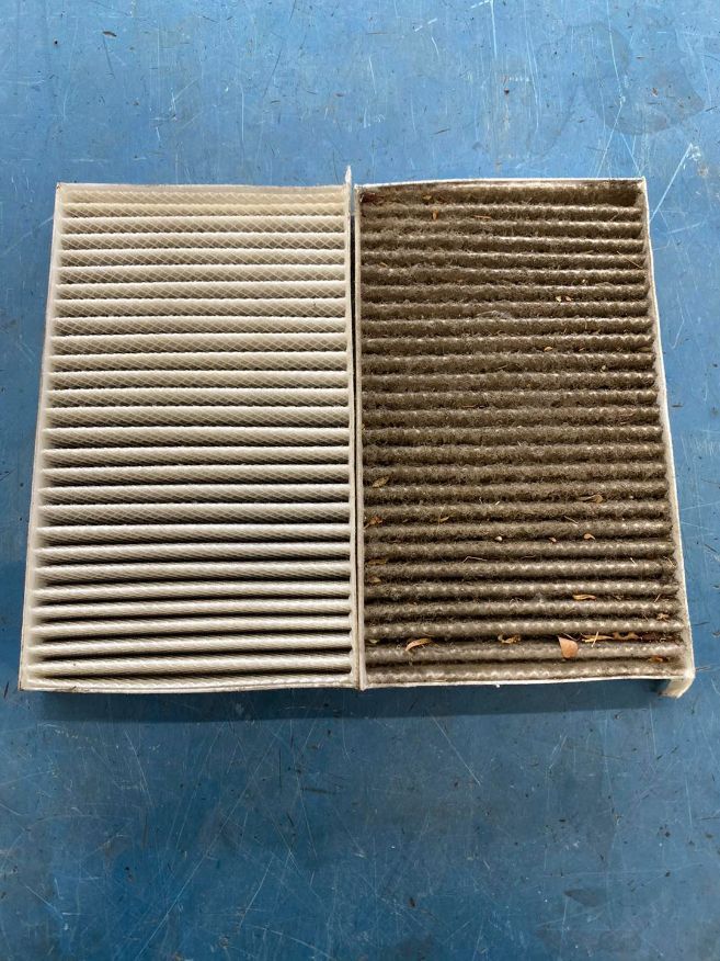 A Dirty and Clean Air Filter on a Blue Surface — Savins Radiator Service In Lismore, NSW
