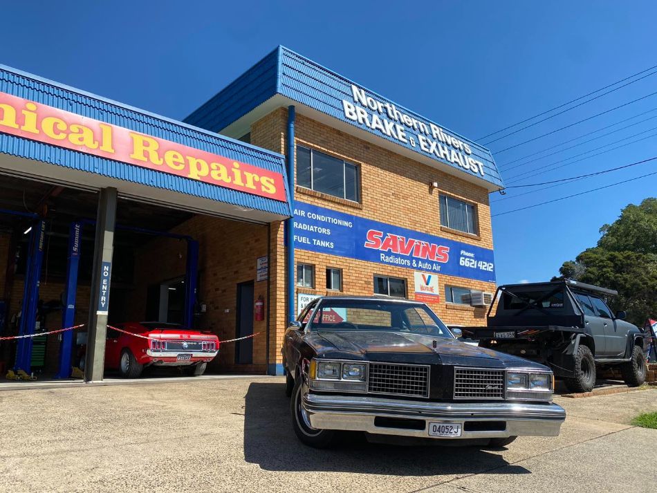 A Car is Parked in Front of a Building — Savins Radiator Service In Lismore, NSW
