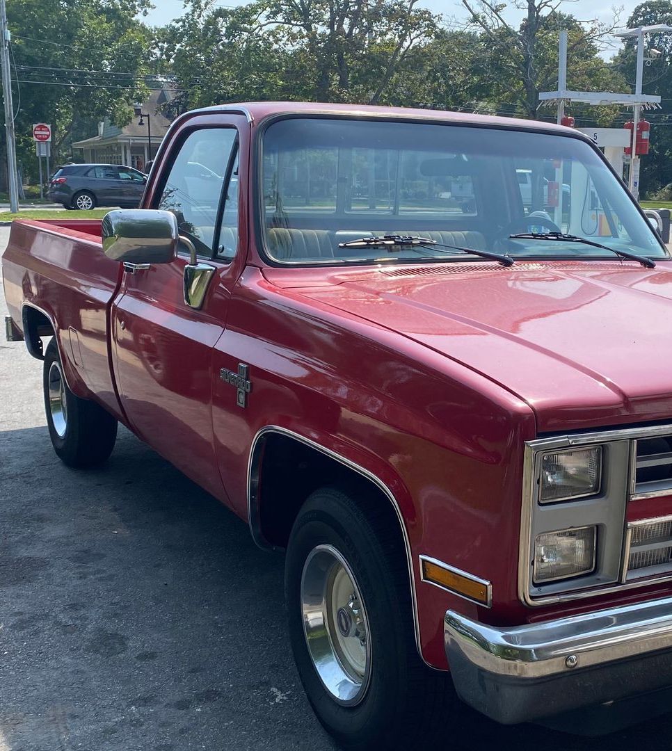Red Chevrolet pickup truck | C & C Automotive Repair Of The Hamptons, Inc.