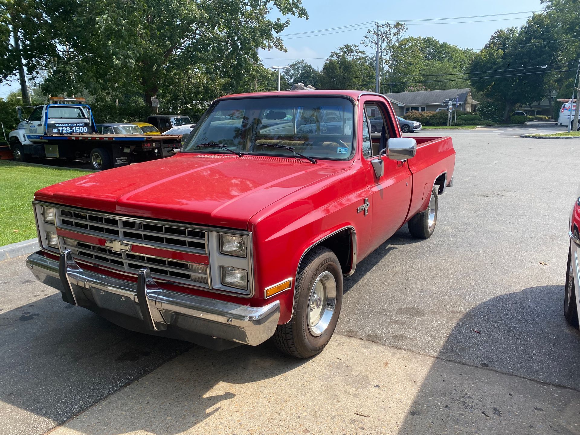 Red Chevrolet pickup truck | C & C Automotive Repair Of The Hamptons, Inc.