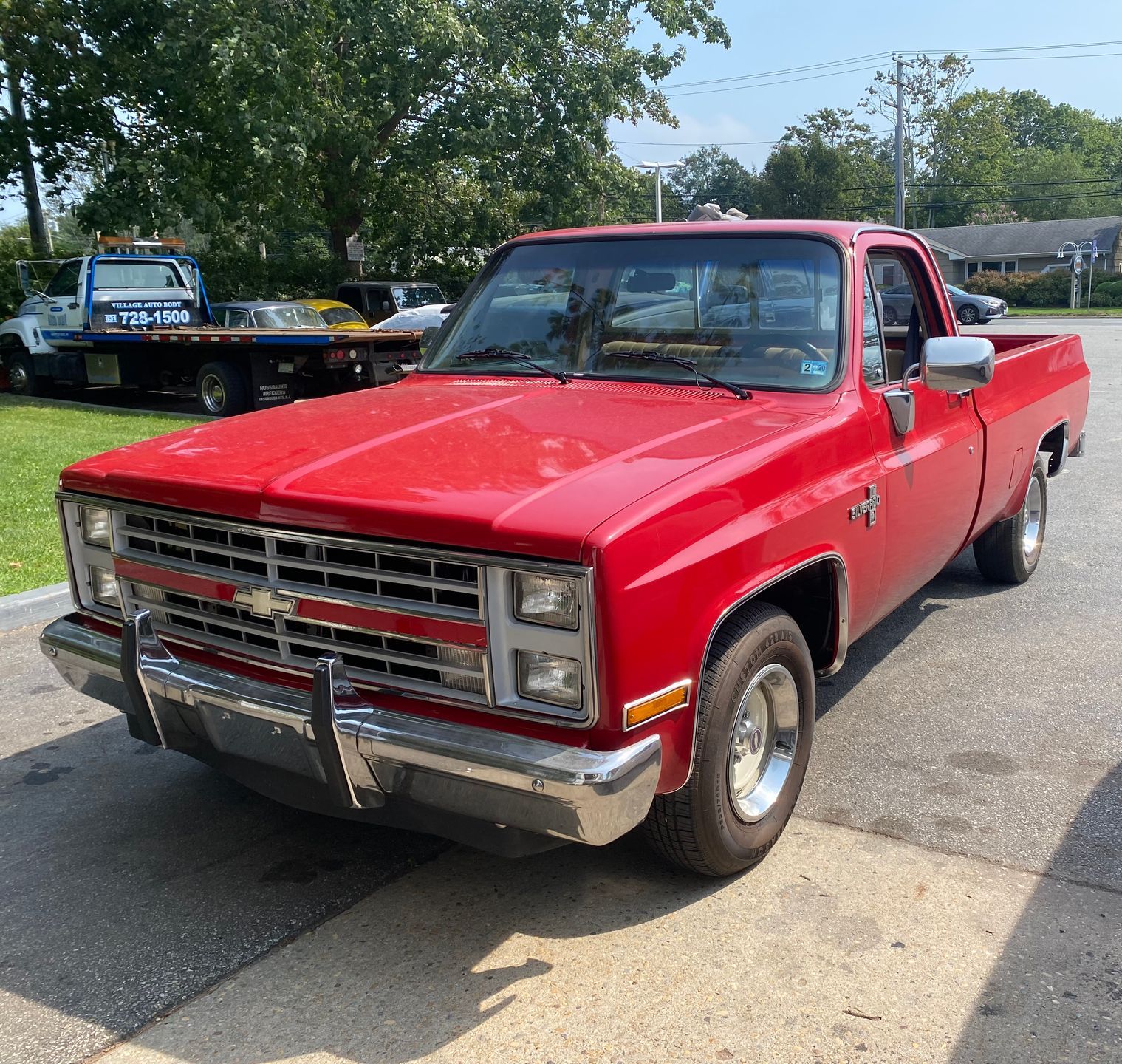 Red Chevrolet pickup truck | C & C Automotive Repair Of The Hamptons, Inc.