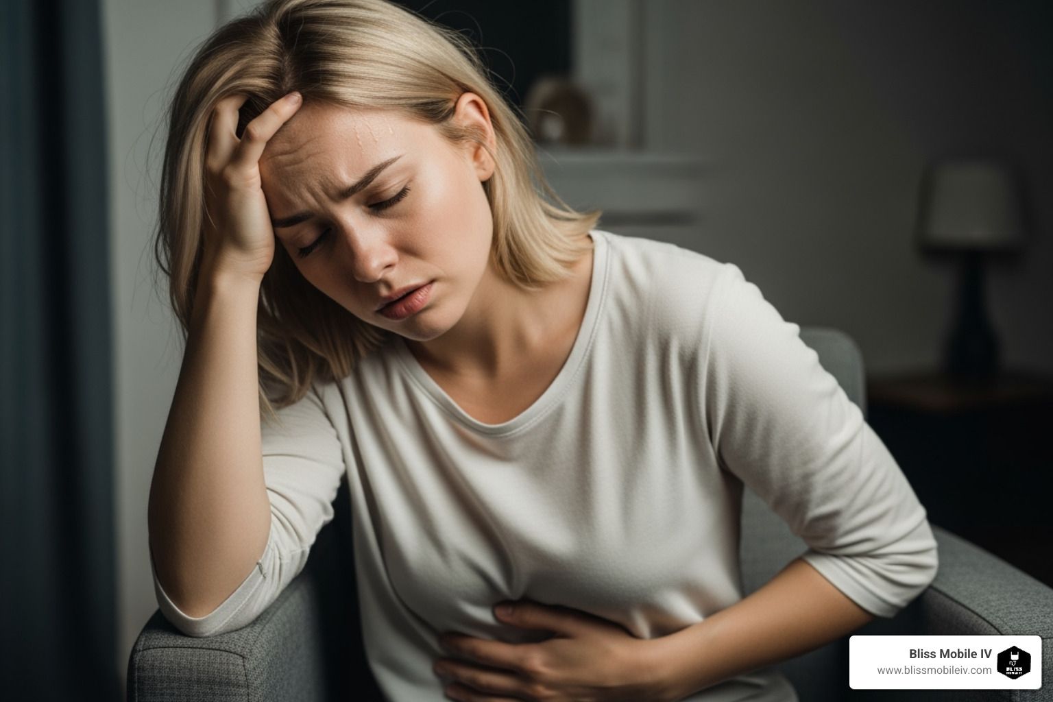 person looking relaxed and comfortable while receiving an IV drip at home; Hangover symptoms; IV the