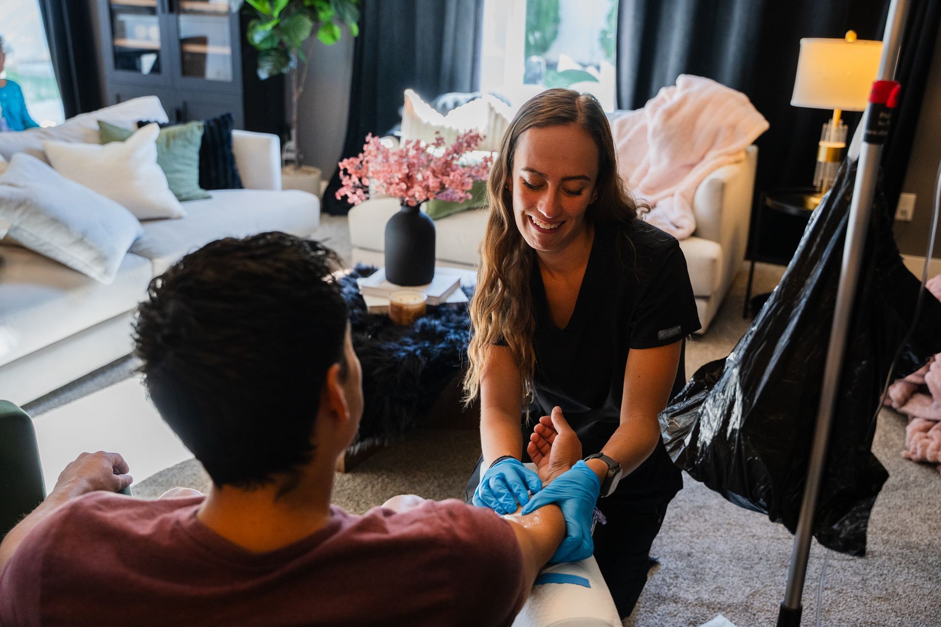 A woman and a little girl are sitting on a couch