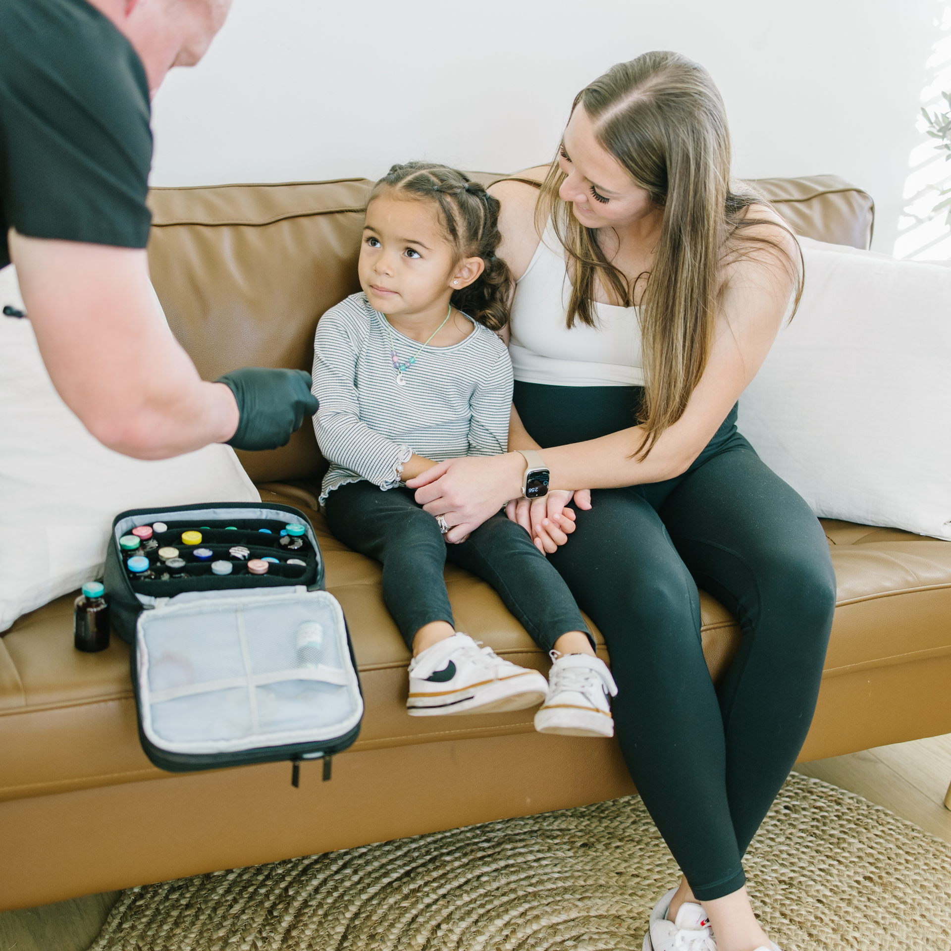 Woman on sitting on a chair getting her blood pressure checked