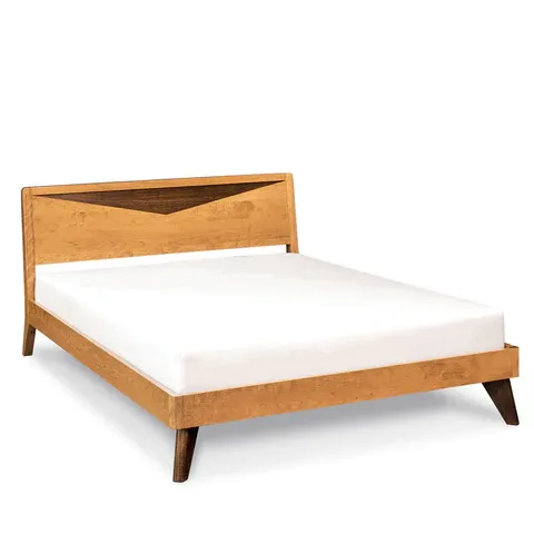 A wooden bed frame with a white mattress on a white background.