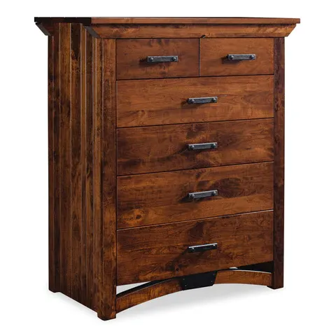 A wooden chest of drawers with metal handles on a white background