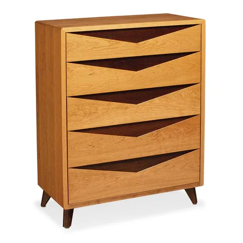 A wooden chest of drawers with a geometric design on the drawers