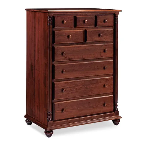 A wooden chest of drawers with a white background
