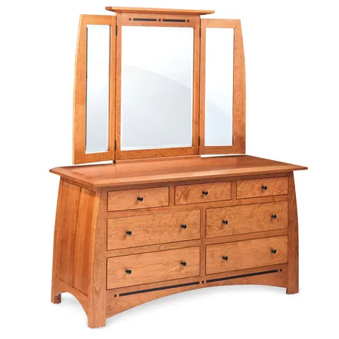 A wooden dresser with a mirror on top of it