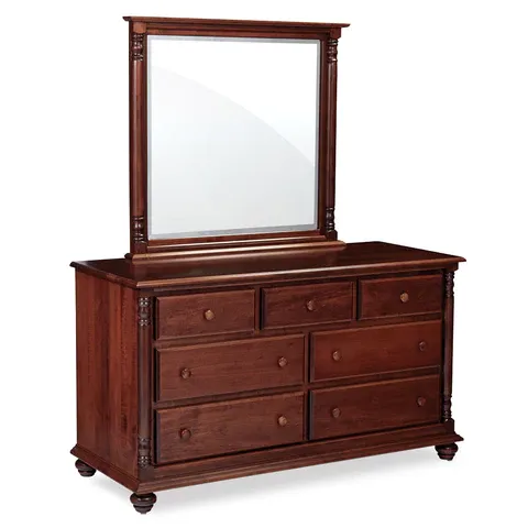 A wooden dresser with a mirror on top of it