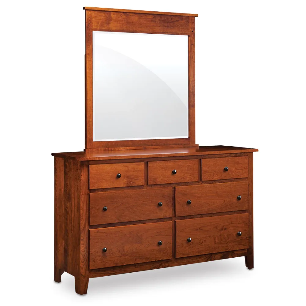 A wooden dresser with a mirror on top of it