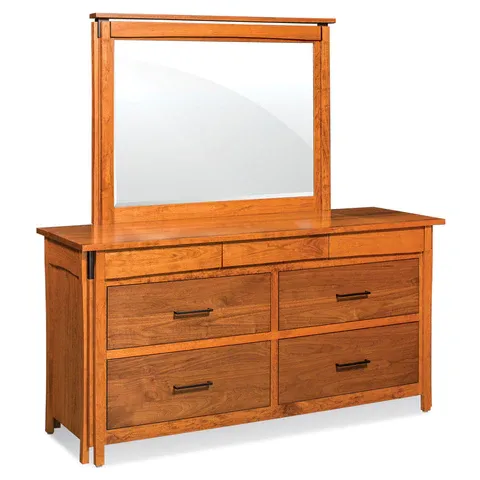 A wooden dresser with drawers and a mirror on top