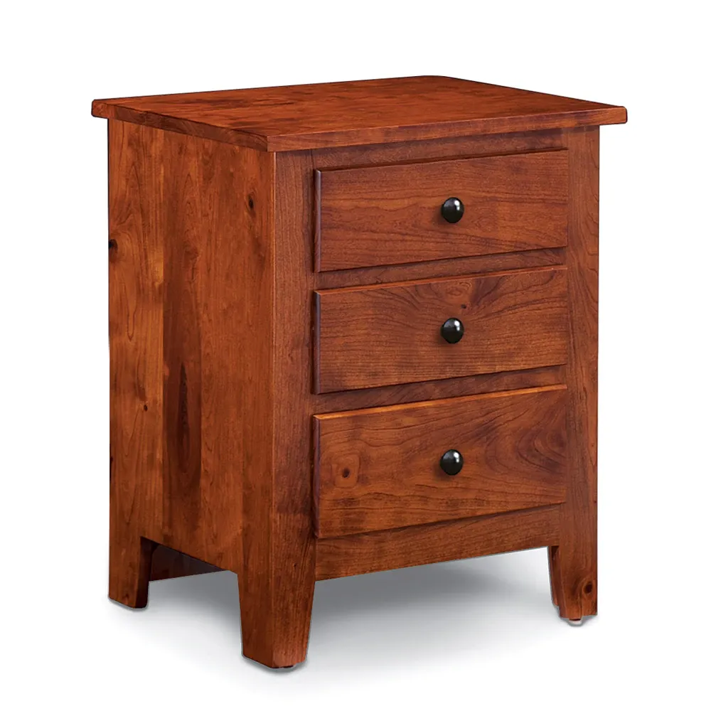 A small wooden nightstand with three drawers on a white background