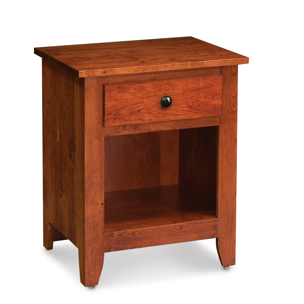 A small wooden nightstand with a drawer and a shelf