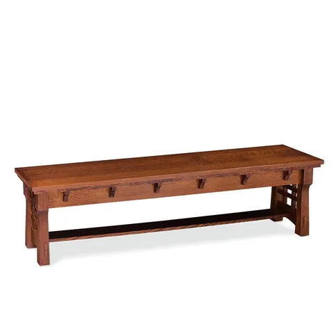 A wooden bench with drawers underneath it on a white background.