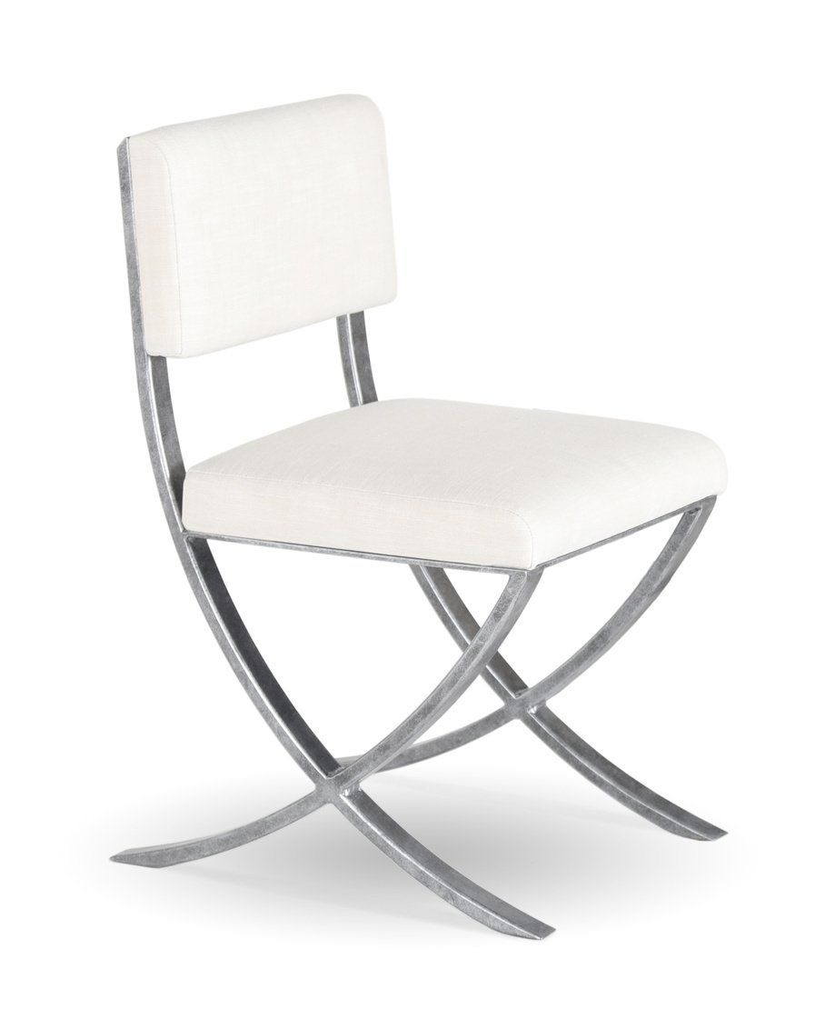 A white chair with a chrome frame on a white background