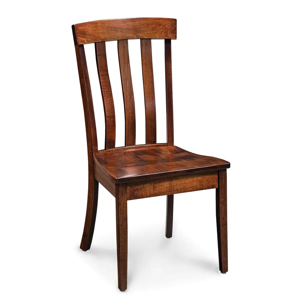 A wooden chair is sitting on a white surface.
