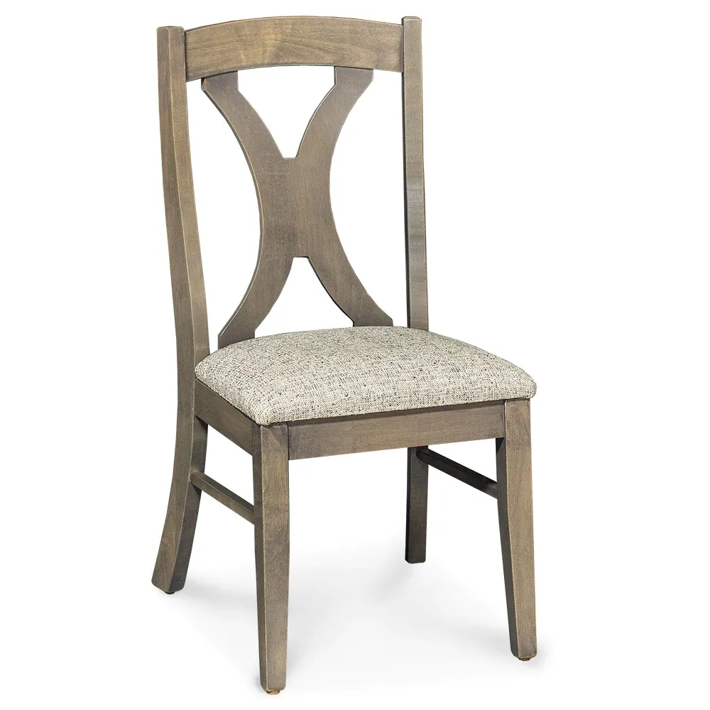 A wooden chair with a cushioned seat on a white background