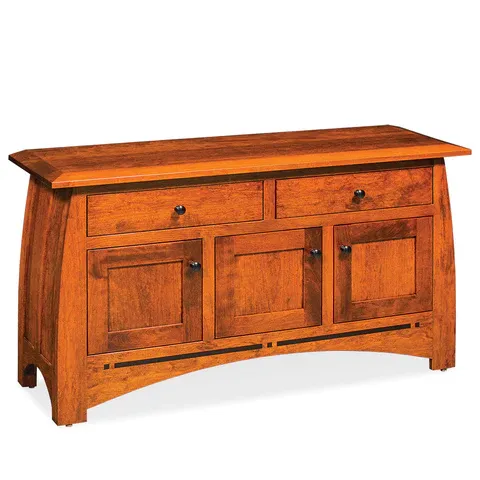 A wooden cabinet with drawers and doors on a white background