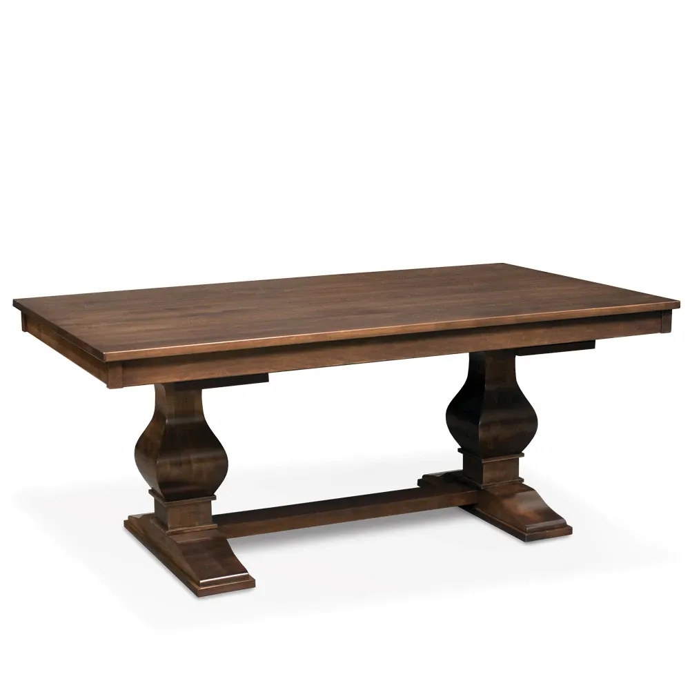 A wooden dining table with a pedestal base on a white background.