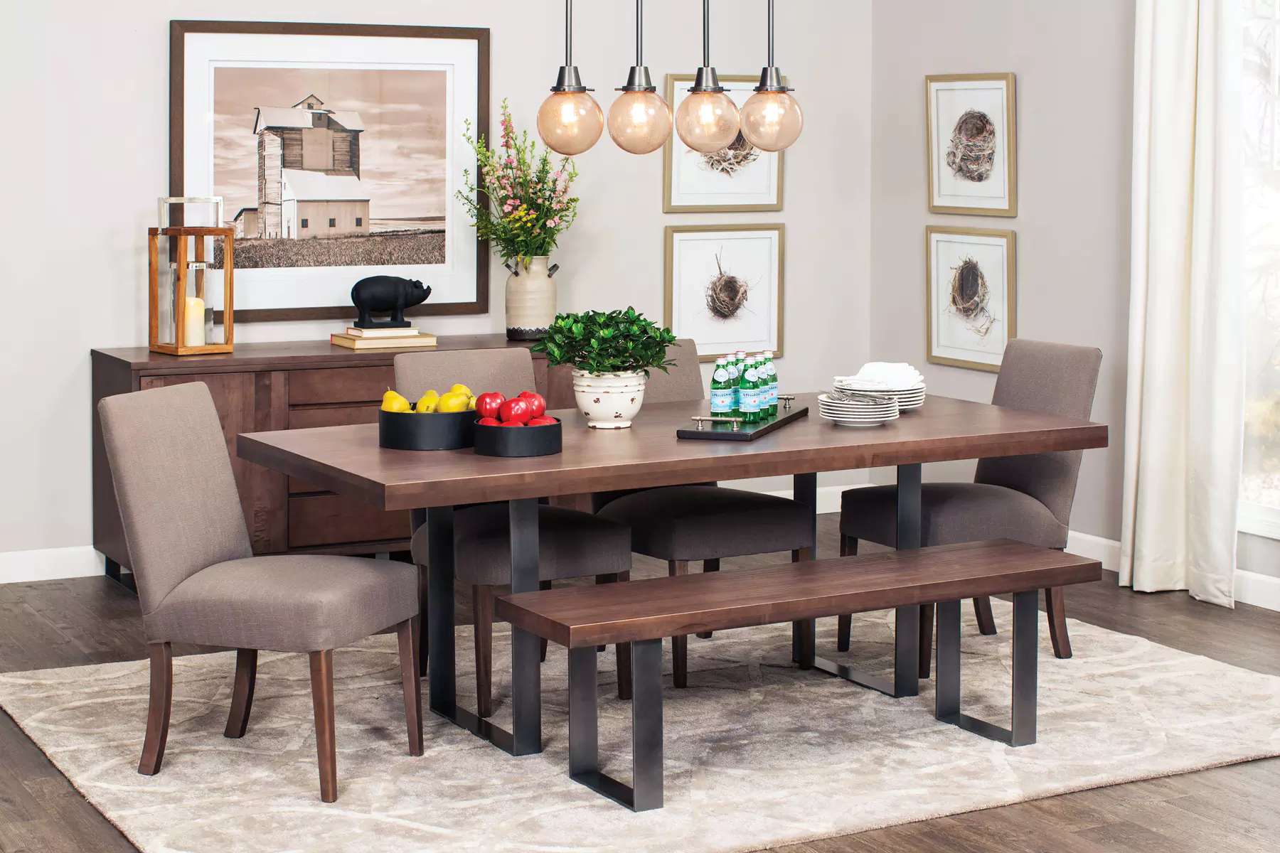 A dining room with a table , chairs , and a bench.