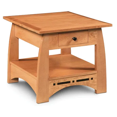 A small wooden table with a drawer underneath it
