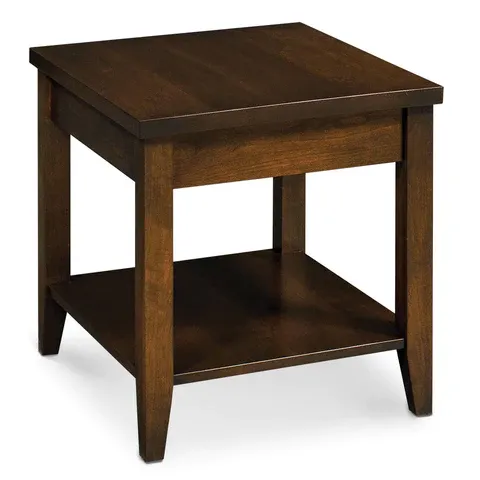 A small wooden table with a shelf underneath it