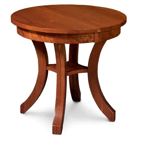 A round wooden table with a shelf underneath it
