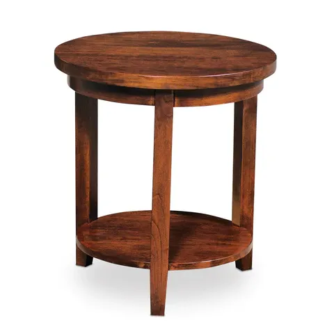 A round wooden table with a shelf underneath it