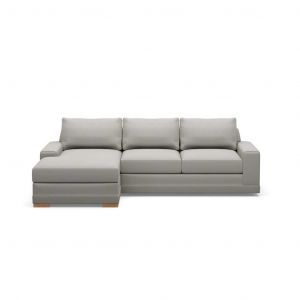 A grey sectional couch with a chaise lounge on a white background.