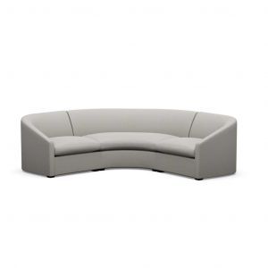 A curved gray couch on a white background.