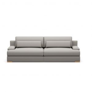 A grey couch with two pillows on a white background.