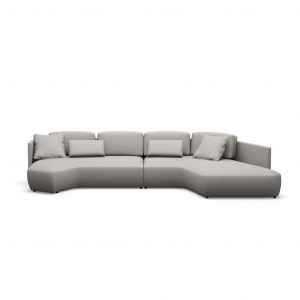 A grey sectional couch with pillows on a white background.