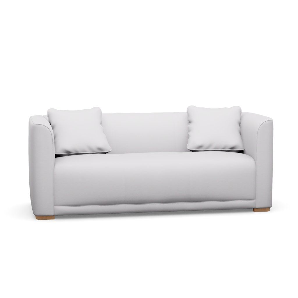 A white couch with two pillows on a white background.
