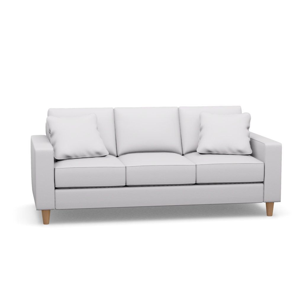 A white couch with wooden legs and pillows on a white background.