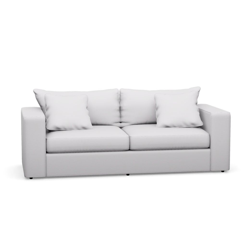 A white couch with two pillows on a white background.