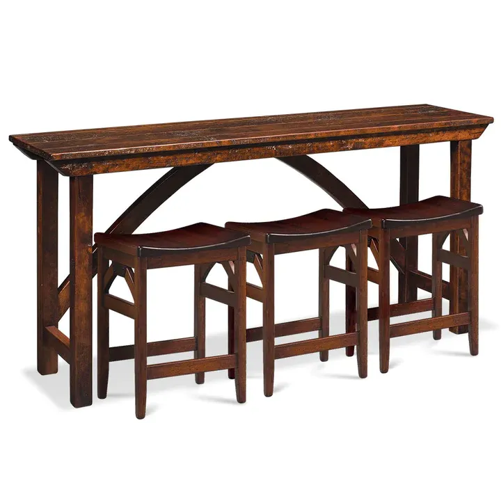 A wooden table with three stools underneath it