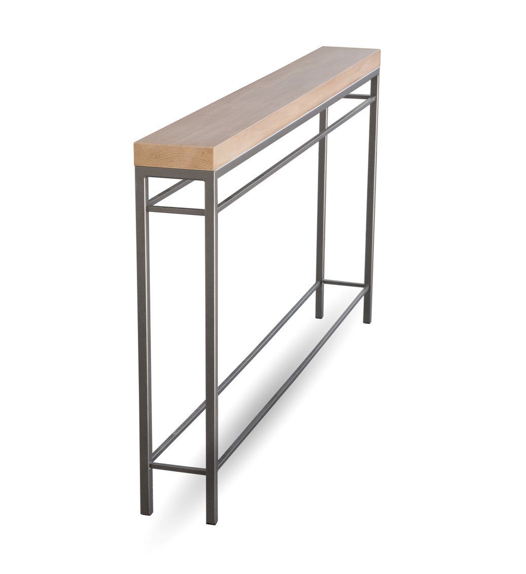 A long wooden table with a metal frame on a white background