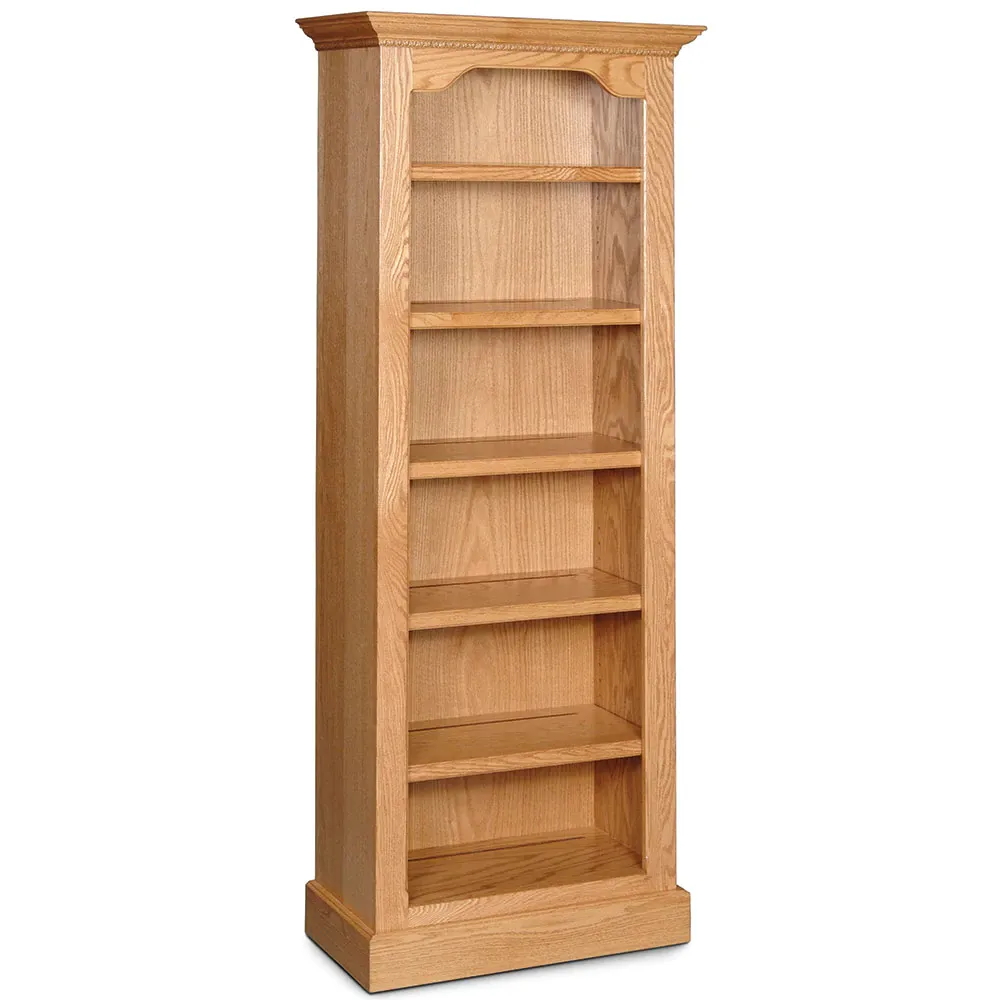 A tall wooden bookcase with five shelves on a white background