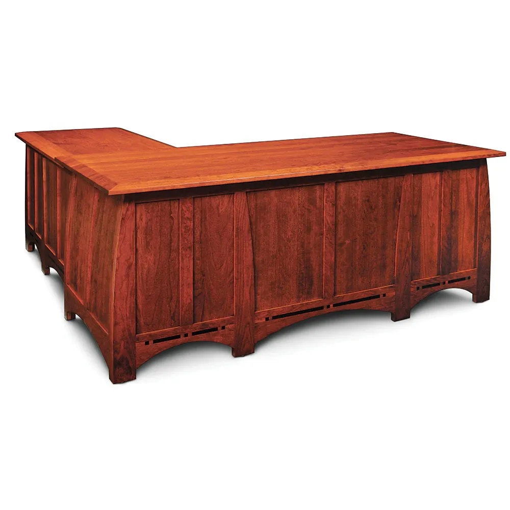 A large wooden desk with a drawer underneath it